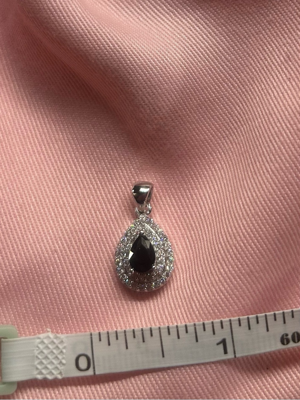Sterling Silver Moissanite Teardrop Pendant with deep purple Center Stone